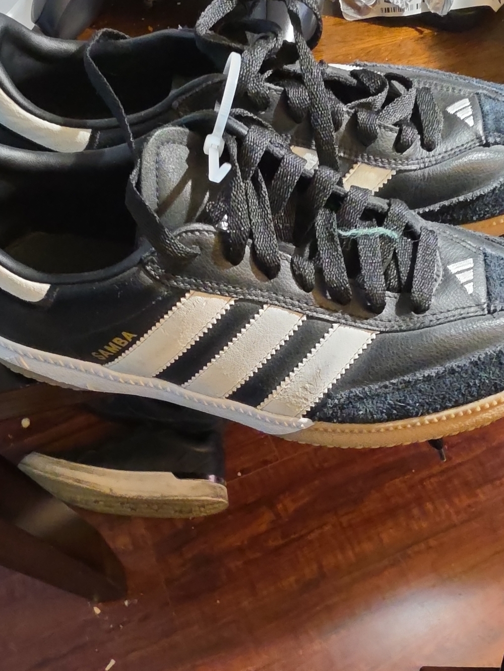adidas black and white Samba-style leather sneakers